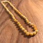 Preview: Bernsteinkette kurz, kleine Perlen, poliert-hell, ca. 45 cm