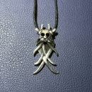 Maskenamulett aus Moesgård / Aarhus, Zinn